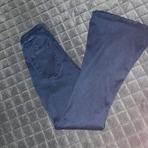 High waisted flare jeans with seam detail.